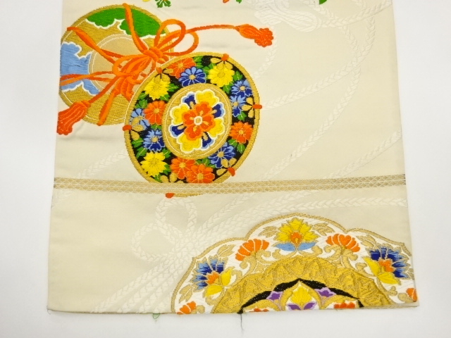  華文に花葉・鼓模様織出し袋帯